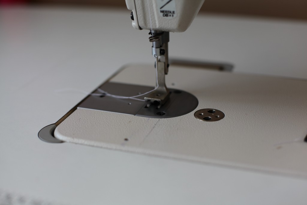 Piping foot on industrial sewing machine for pillow making