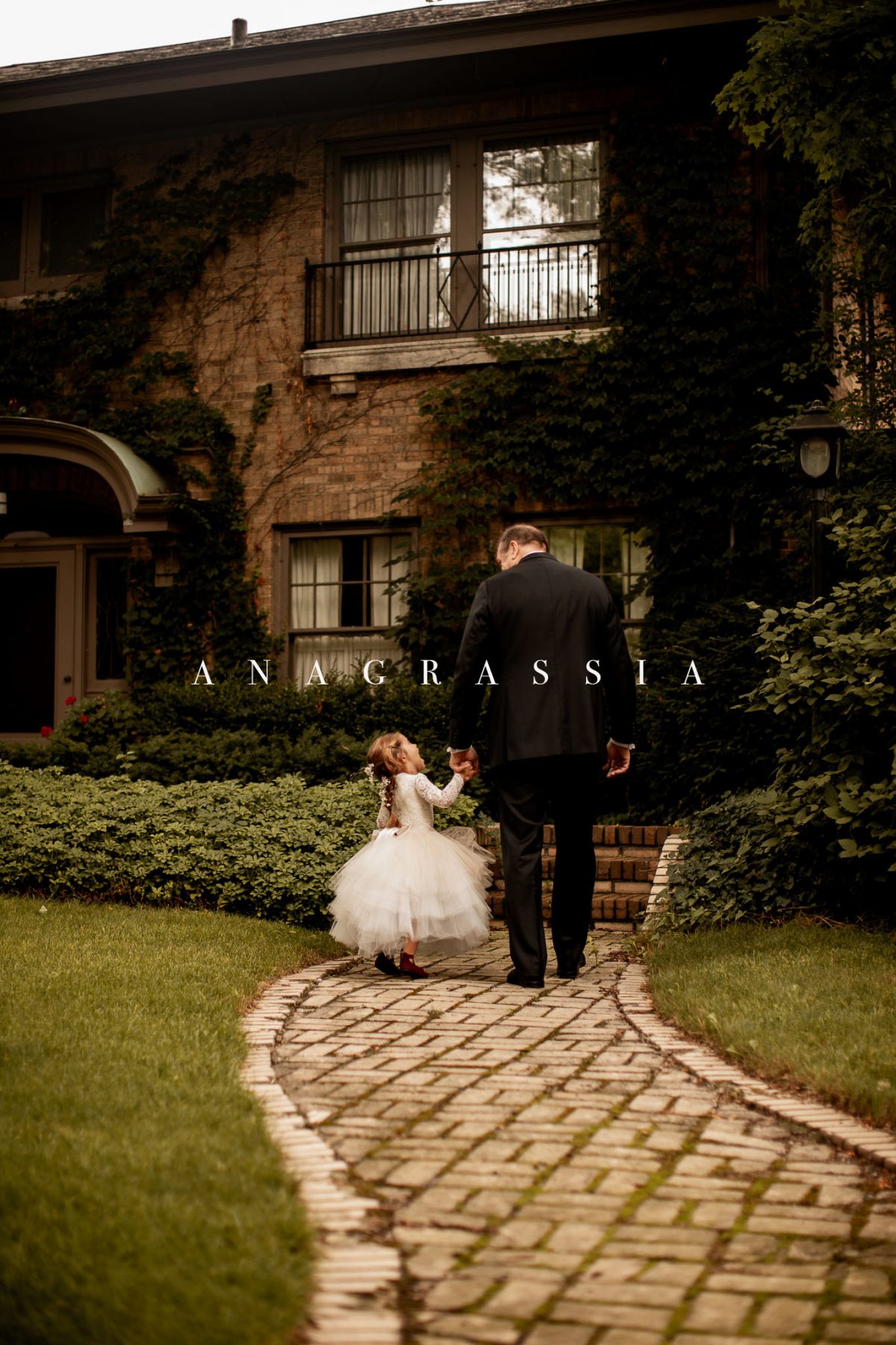 grandfather with flower girl 