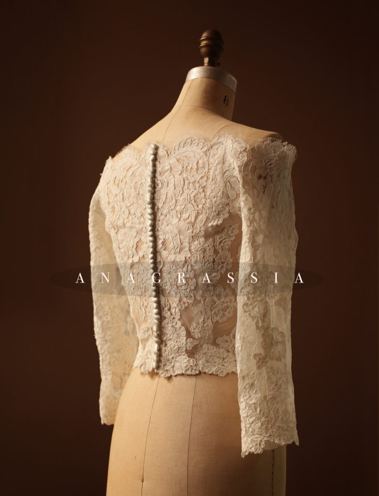 A custom handmade Ivory White Alencon Lace Bolero Topper Cover UP Jacket for winter wedding. Anagrassia used floral applique for couture sewing techniques.