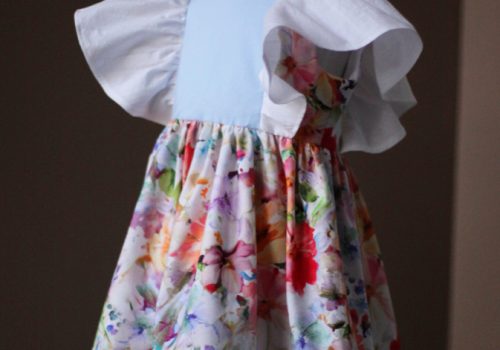 Light blue and floral pinafore dress
