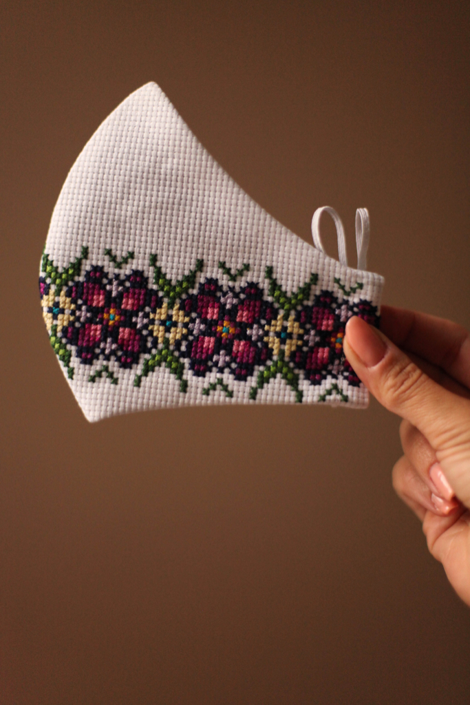 Purple green hand embroidered face mask with Ukrainian design