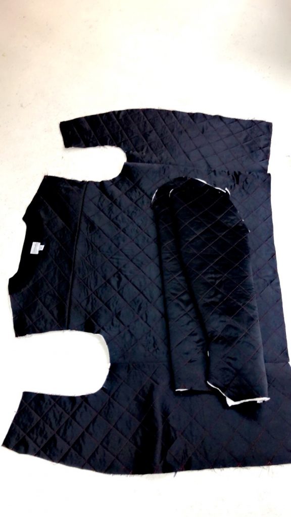Black quilted silk lining